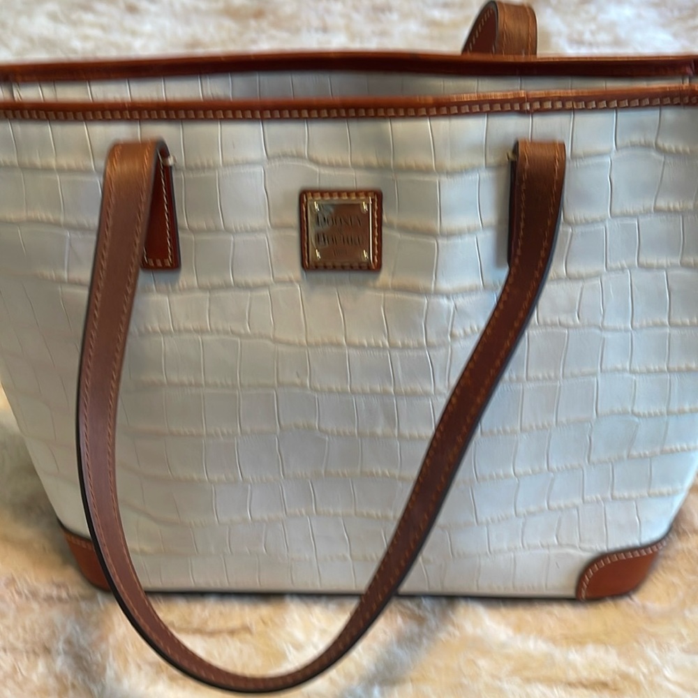Brand new Dooney & Bourke purse.  Pure Italian leather.  Never used.